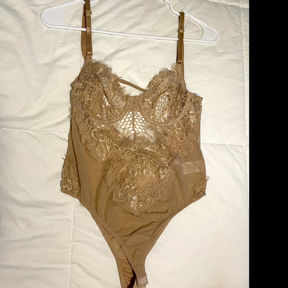 Brown body suit